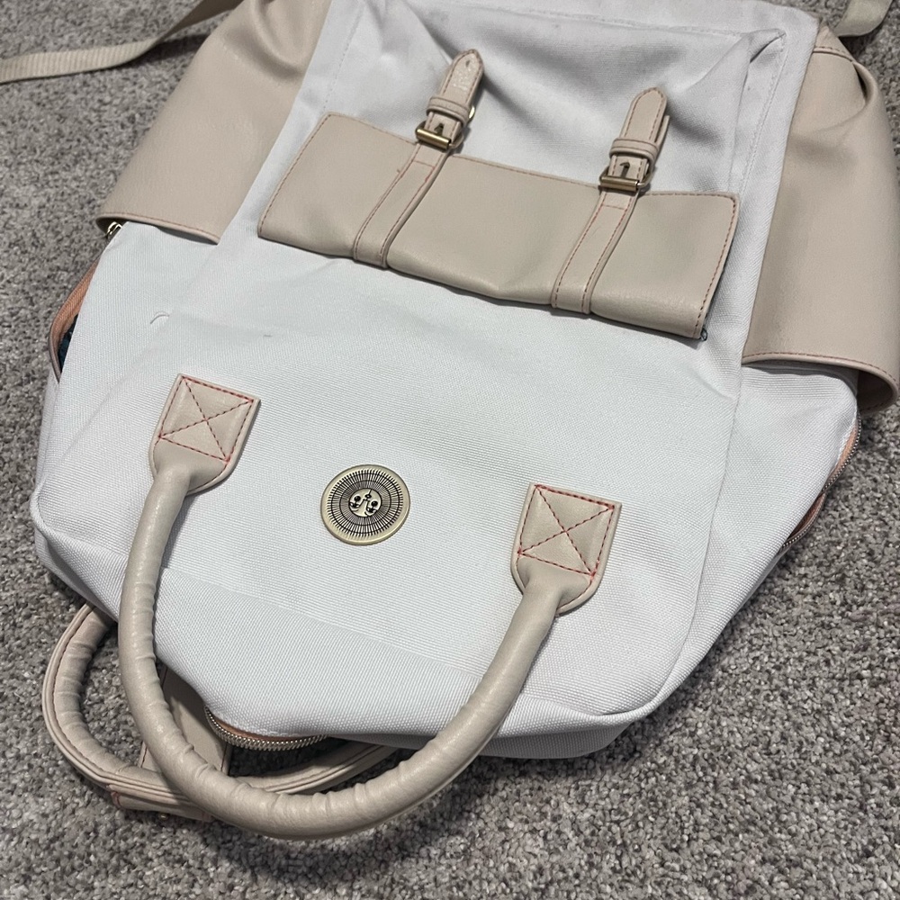 Jungalow Stylish Cream and White Women's Backpack with interior jungle print